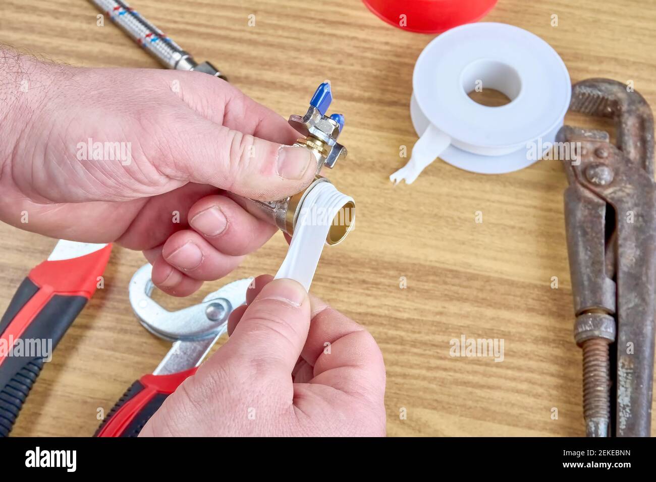 DIY repair, keys, tape reel hose ball valve Stock Photo Alamy