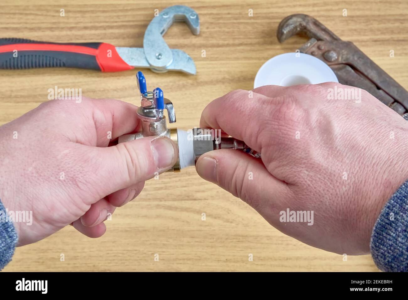 DIY repair, keys, tape reel hose ball valve Stock Photo Alamy