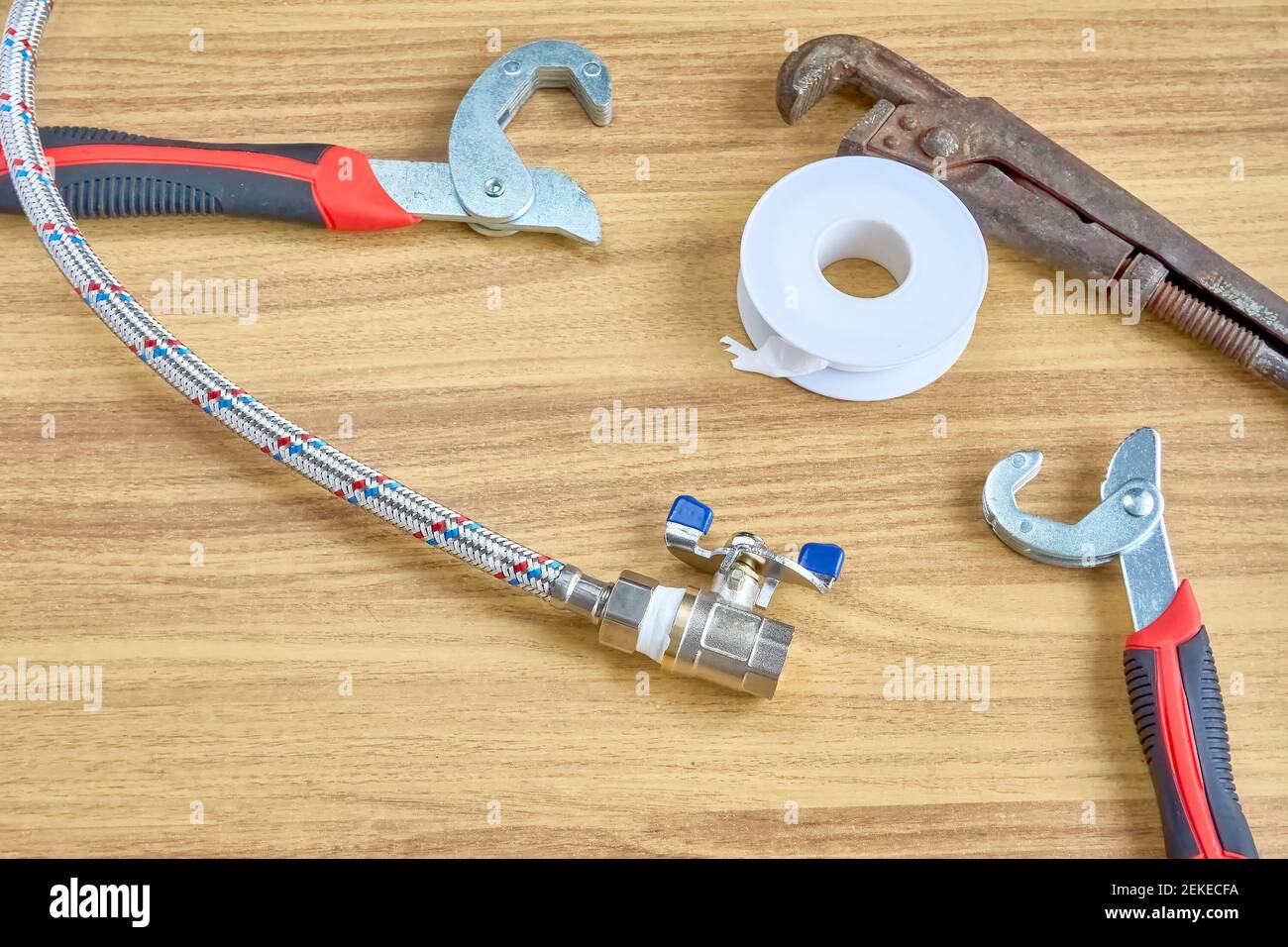DIY repair, keys, tape reel hose ball valve Stock Photo Alamy