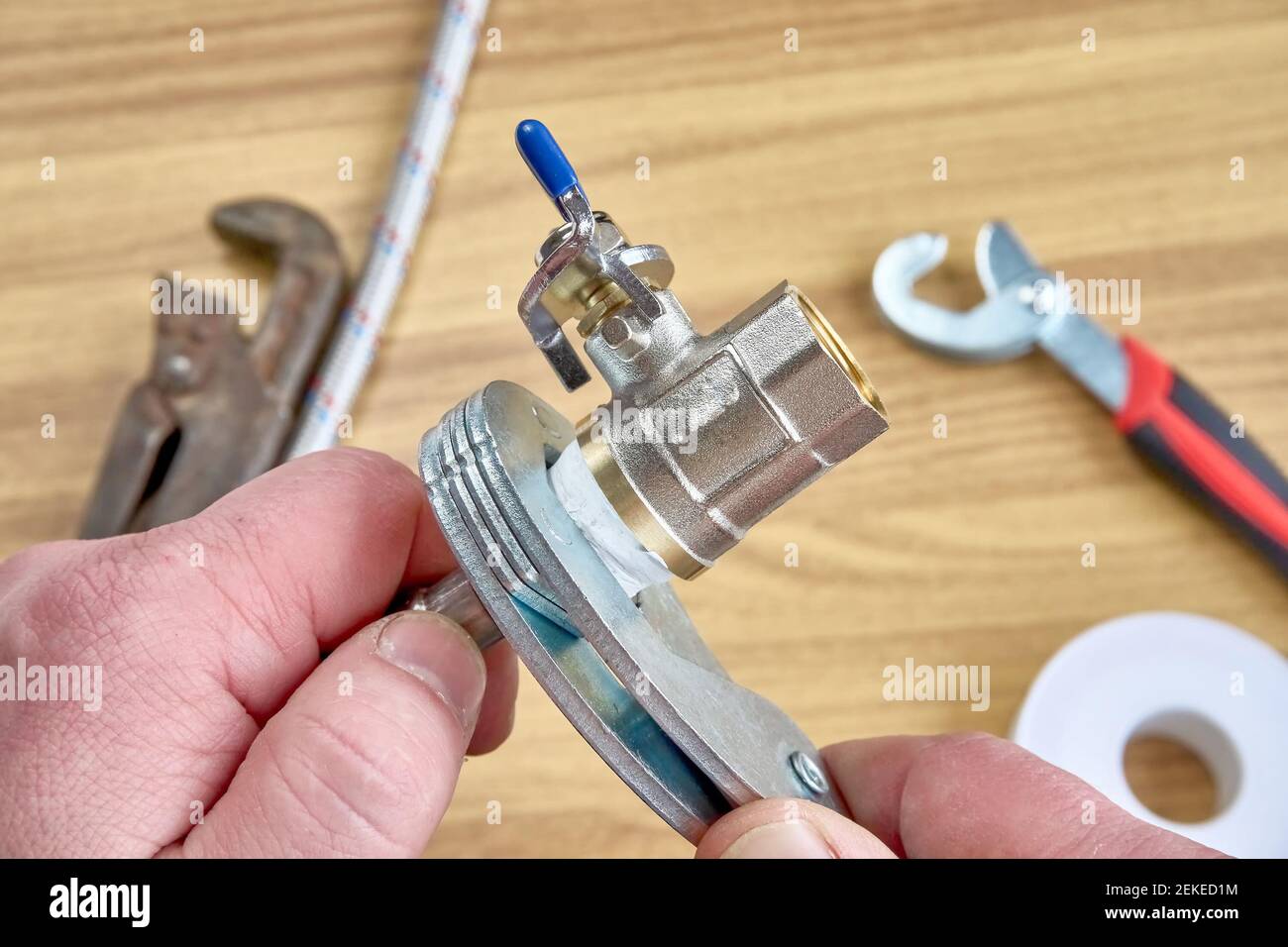 DIY repair, keys, tape reel hose ball valve Stock Photo Alamy