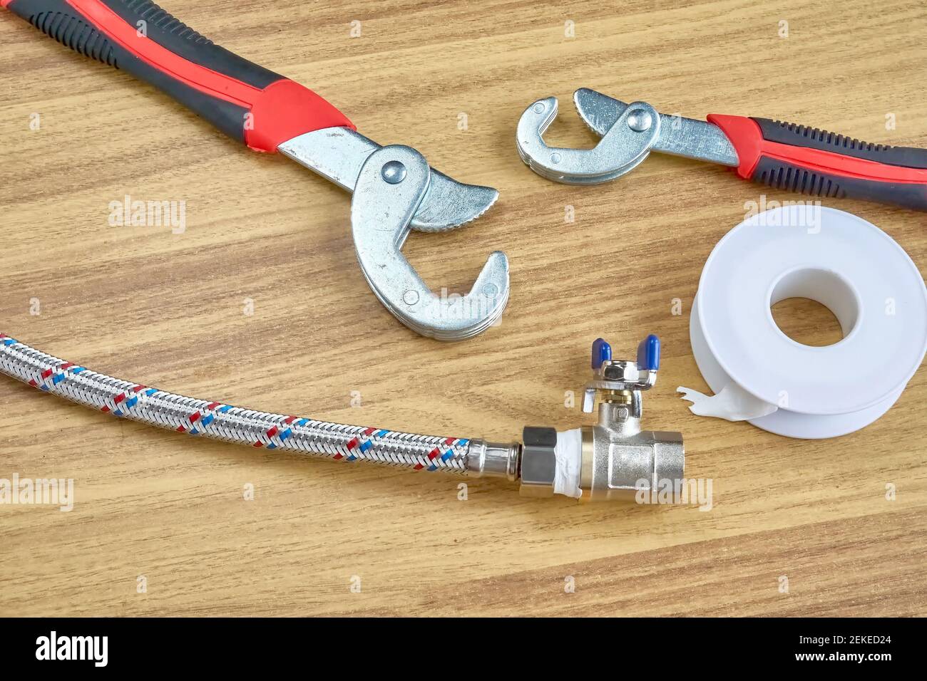 DIY repair, keys, tape reel hose ball valve Stock Photo Alamy