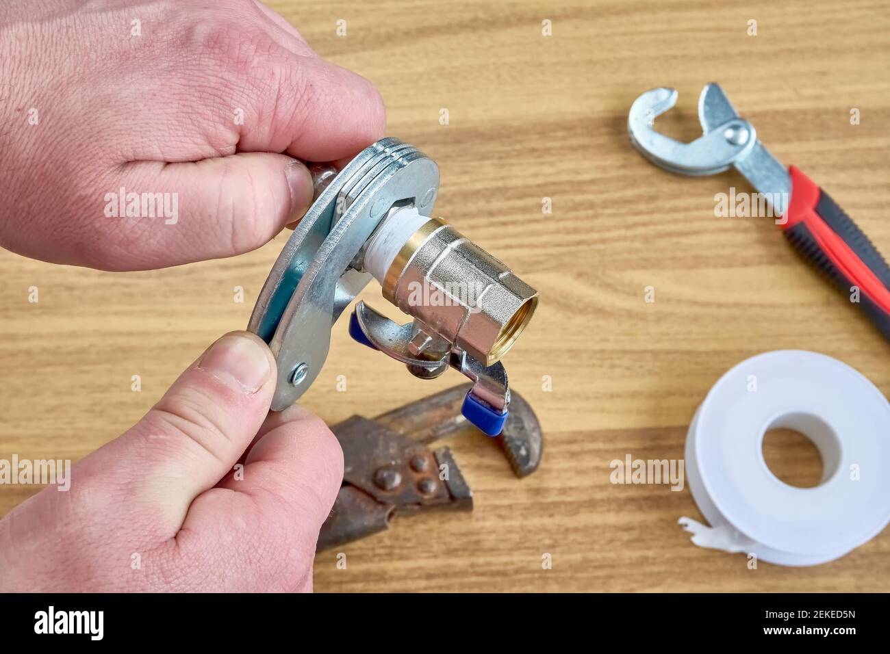 DIY repair, keys, tape reel hose ball valve Stock Photo Alamy