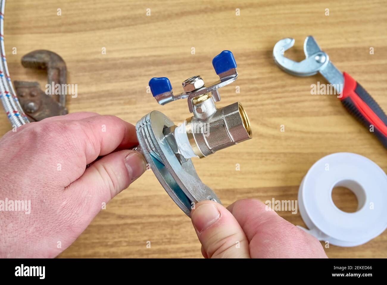 DIY repair, keys, tape reel hose ball valve Stock Photo Alamy