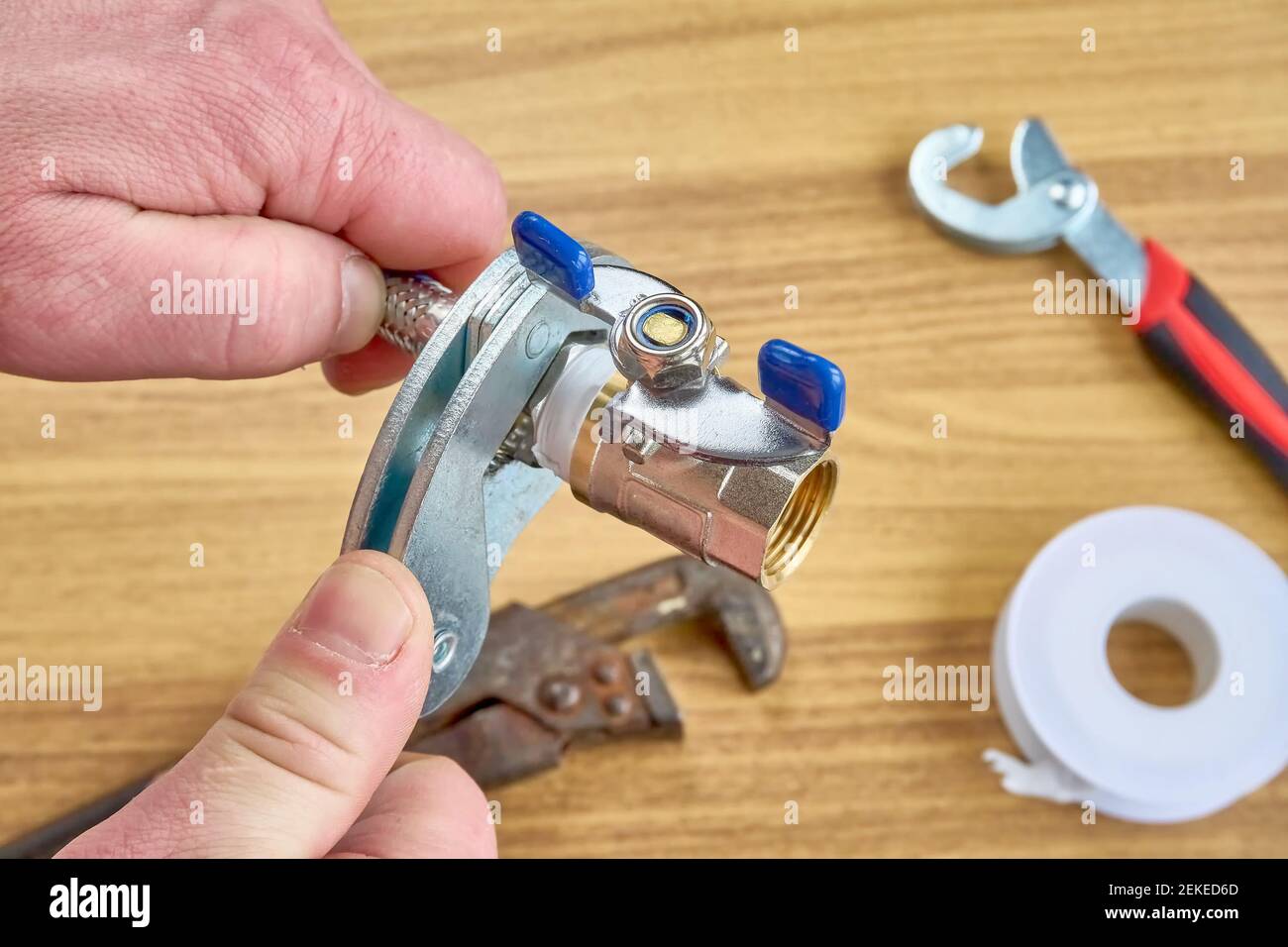 DIY repair, keys, tape reel hose ball valve Stock Photo Alamy