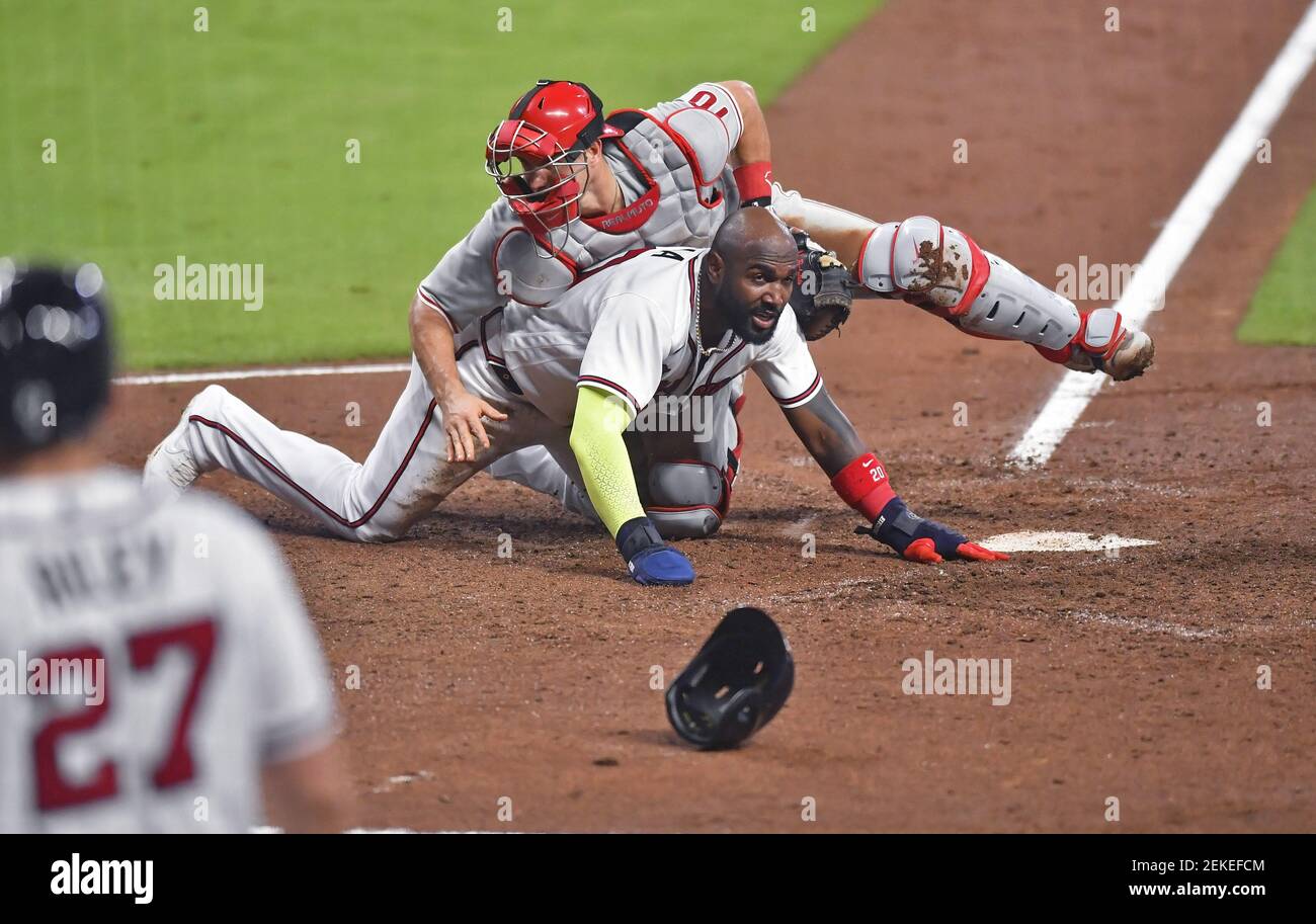 Download Marcell Ozuna With Catcher Wallpaper