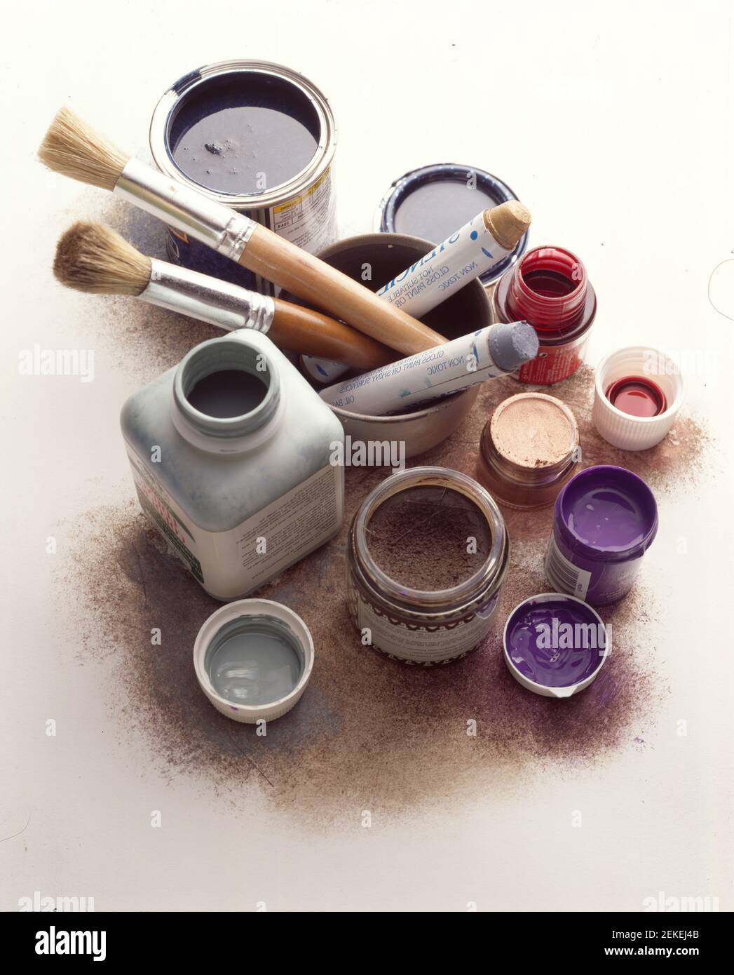 Paint pots and brush materials for craft or diy projects Stock Photo