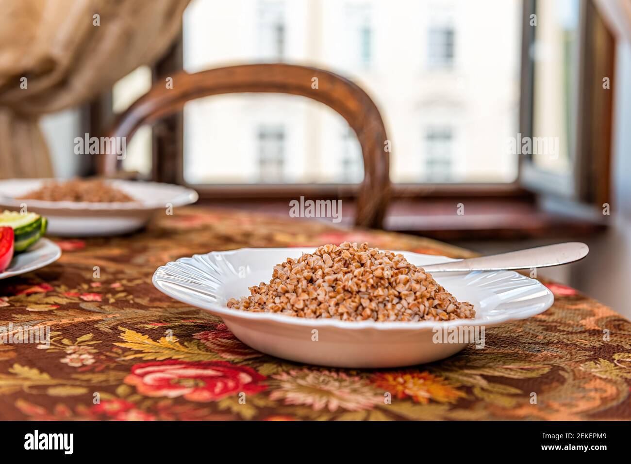 dinner leftovers (buckwheat kasha, vegetables, stir fry) in glass containers  with drawer cabinet in background Stock Photo - Alamy