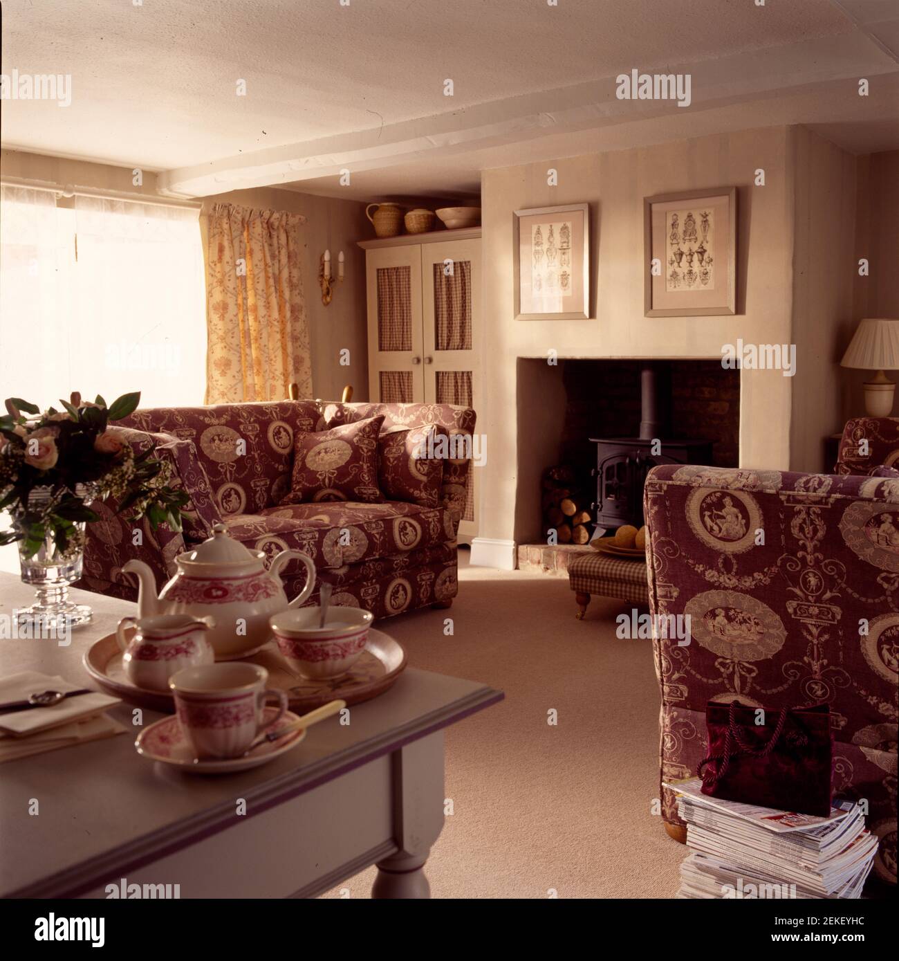 Traditional sitting room with wood burner Stock Photo Alamy
