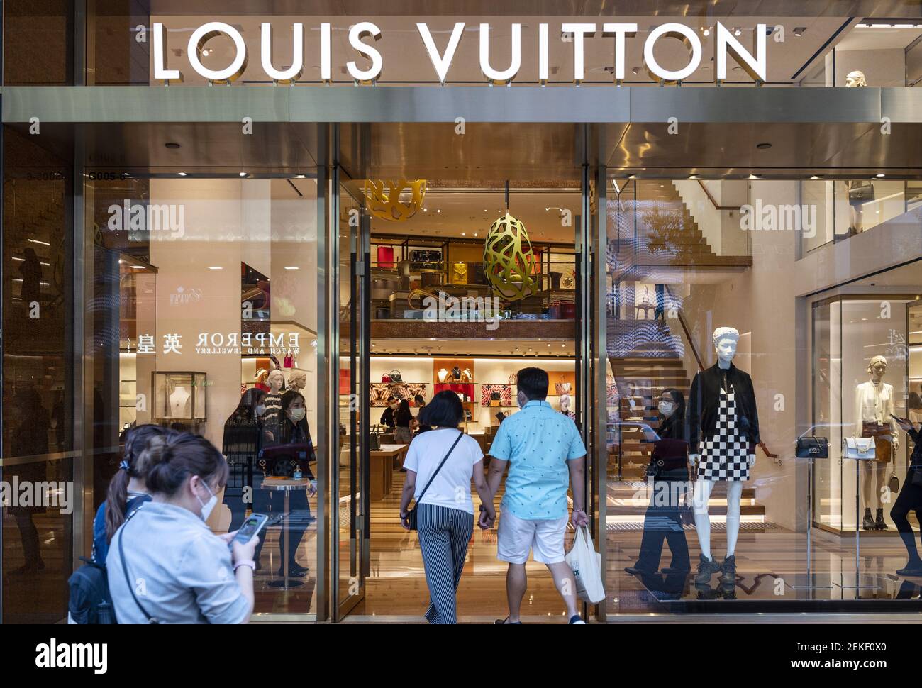 French luxury fashion brand Vuitton store seen in Hong Kong. (Photo by Budrul Chukrut / USA Stock Photo - Alamy