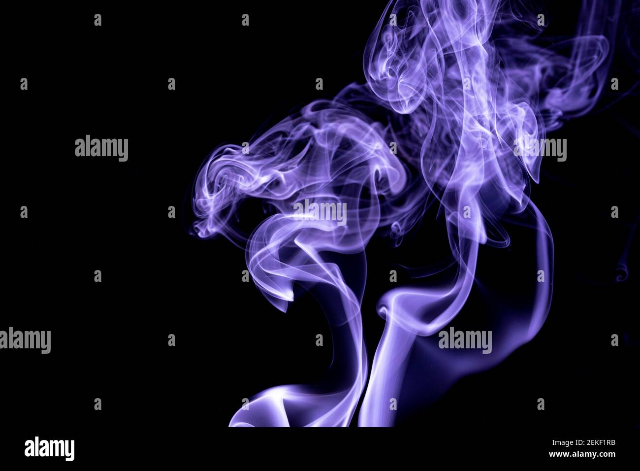 purple smoke texture on black background Stock Photo
