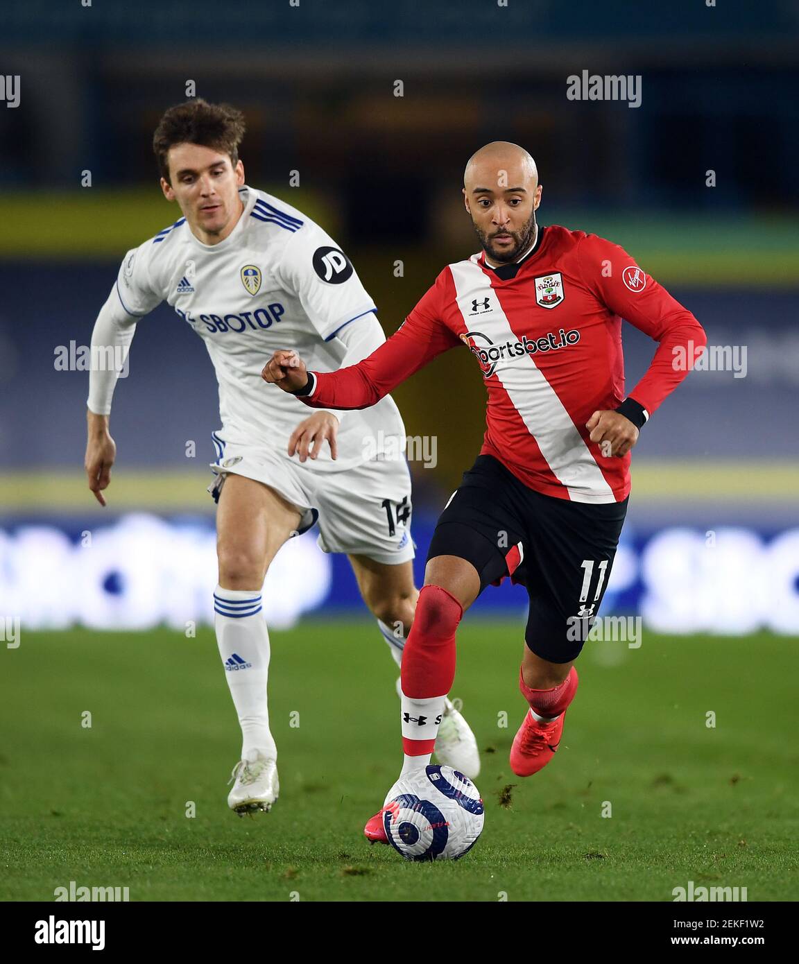 Southampton's Nathan Redmond (right) and Leeds United's Diego Llorente during the Premier League match at Elland Road, Leeds. Picture date: Tuesday February 23, 2021. Stock Photo