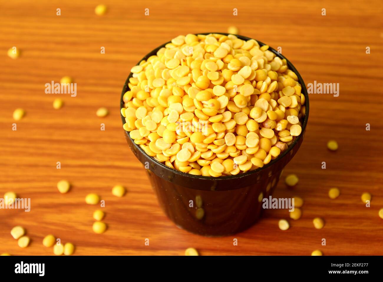 split pigeon peas ( Arhar Dal ) Organic Toor Dal in black Bowl