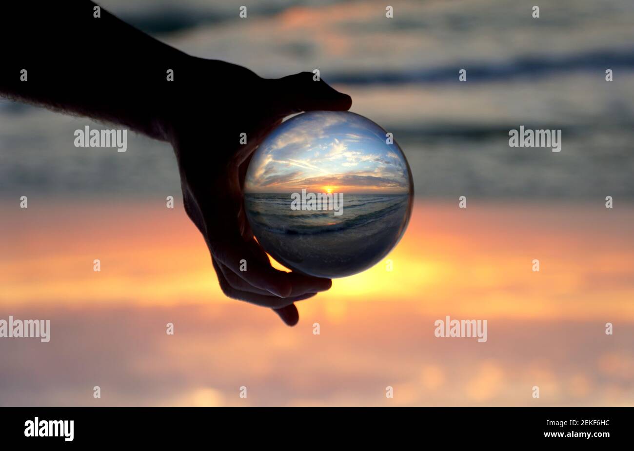 Beautiful sunset captured through a lens ball at Madeira Beach, Florida ...