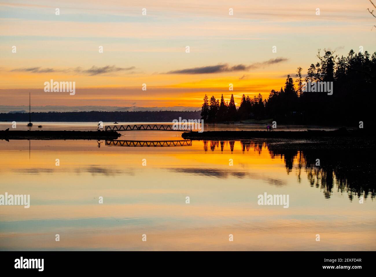 Silhouette of runner at Port Blakely Bridge at sunrise, Bainbridge