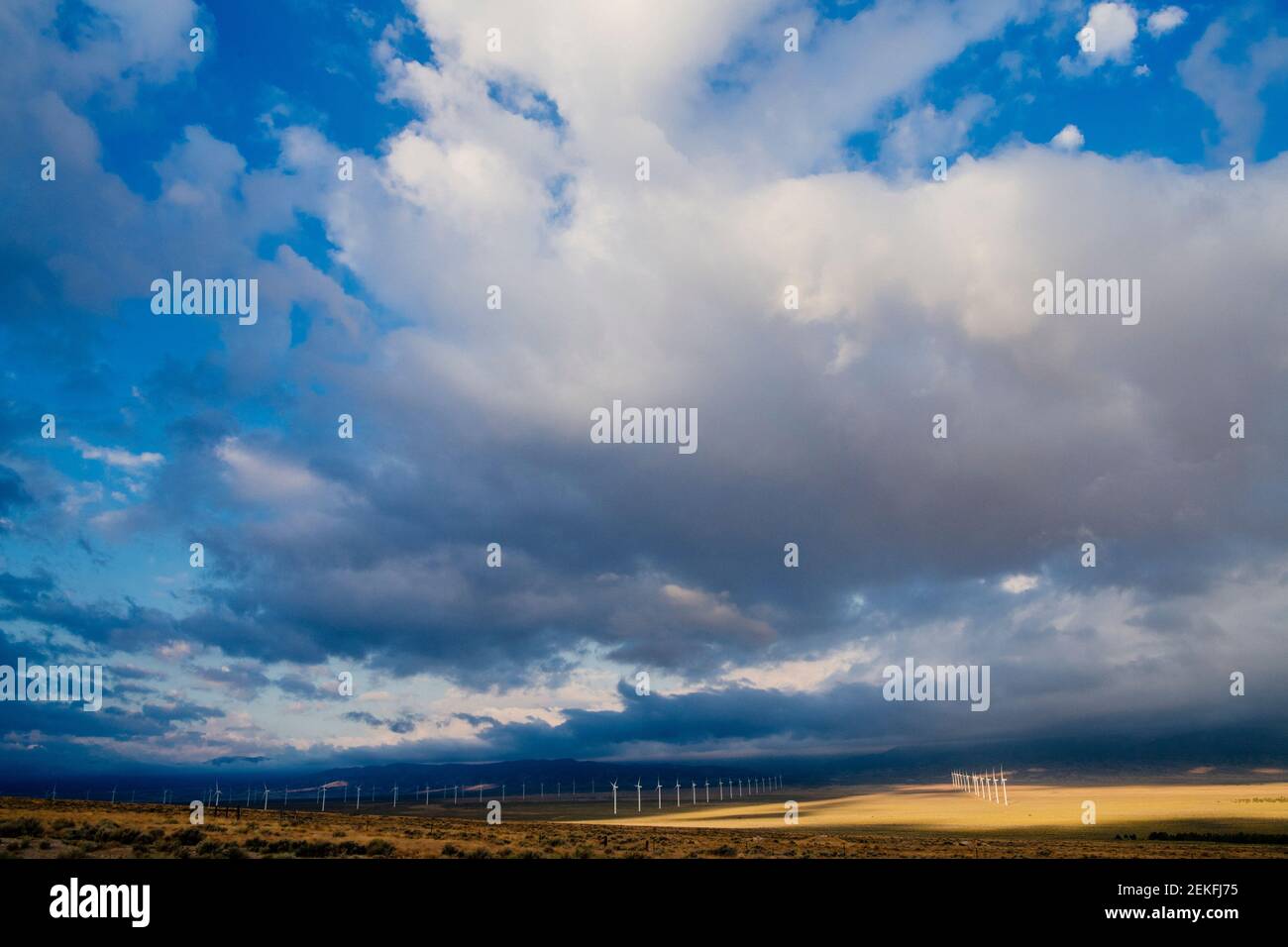 Cumulus clouds over wind turbines, Great Basin National Park, Nevada, USA Stock Photo