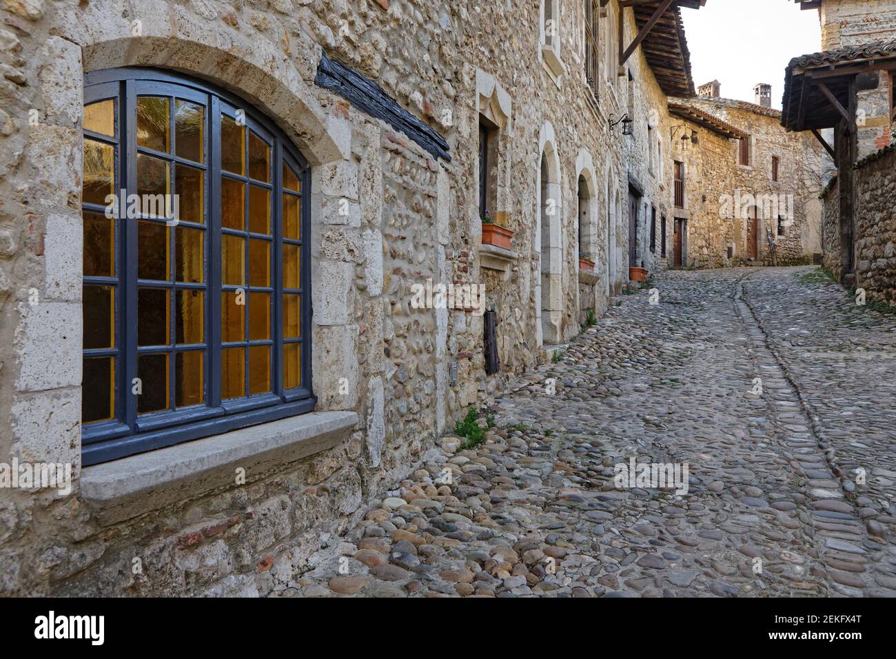 PEROUGES, FRANCE, February 23, 2021 : A street of the old medieval town ...