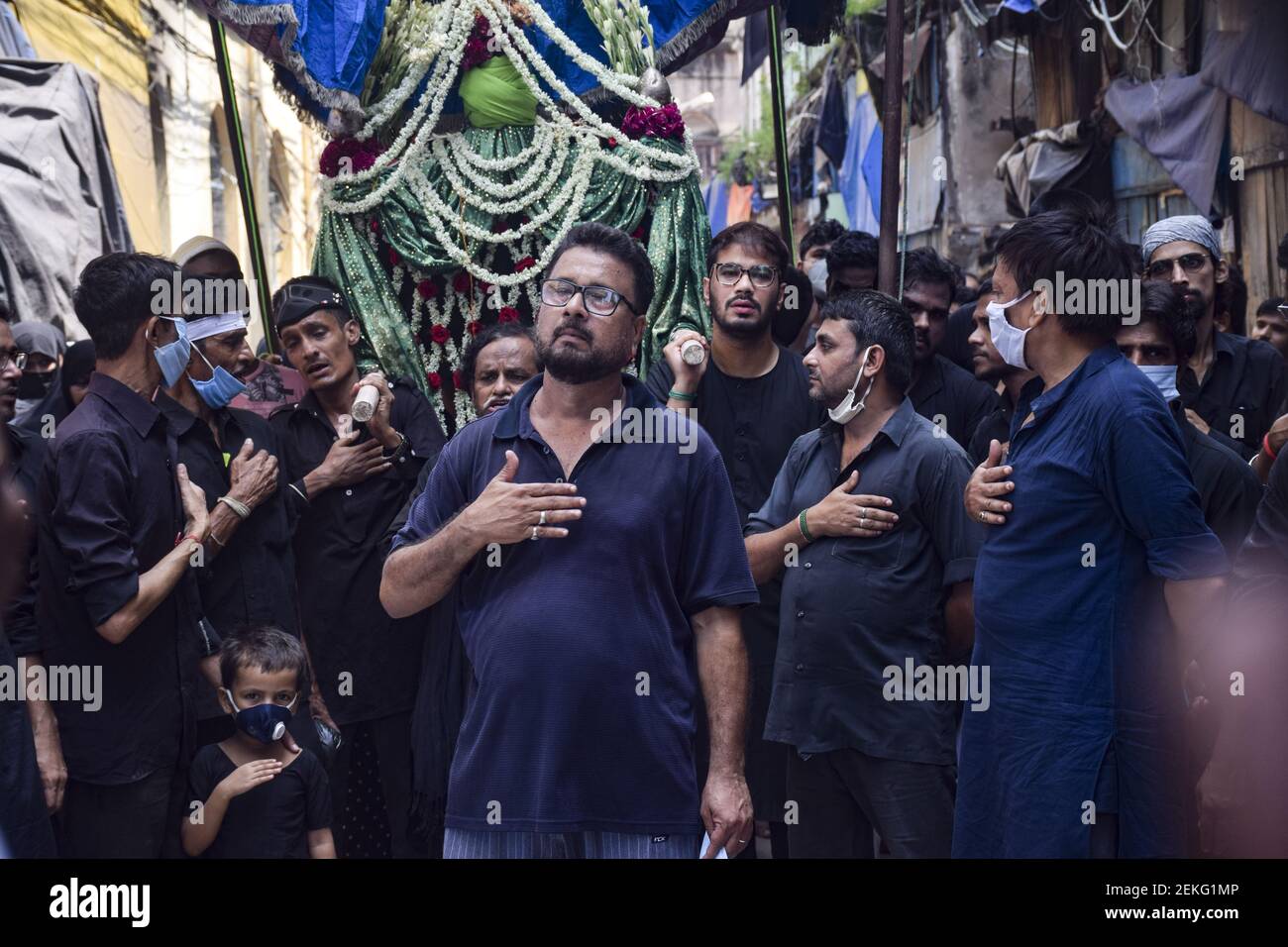 Muslims take part in a Muharram procession. Muharram is the holy ...