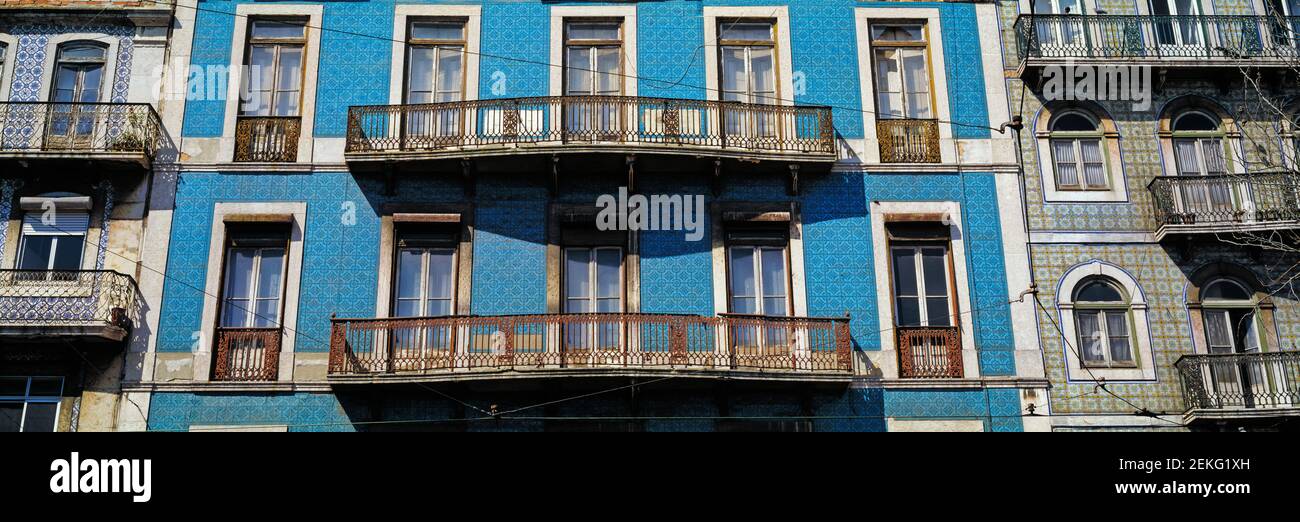 Blue traditional Portuguese tiles on townhouse facade, Lisbon, Portugal Stock Photo