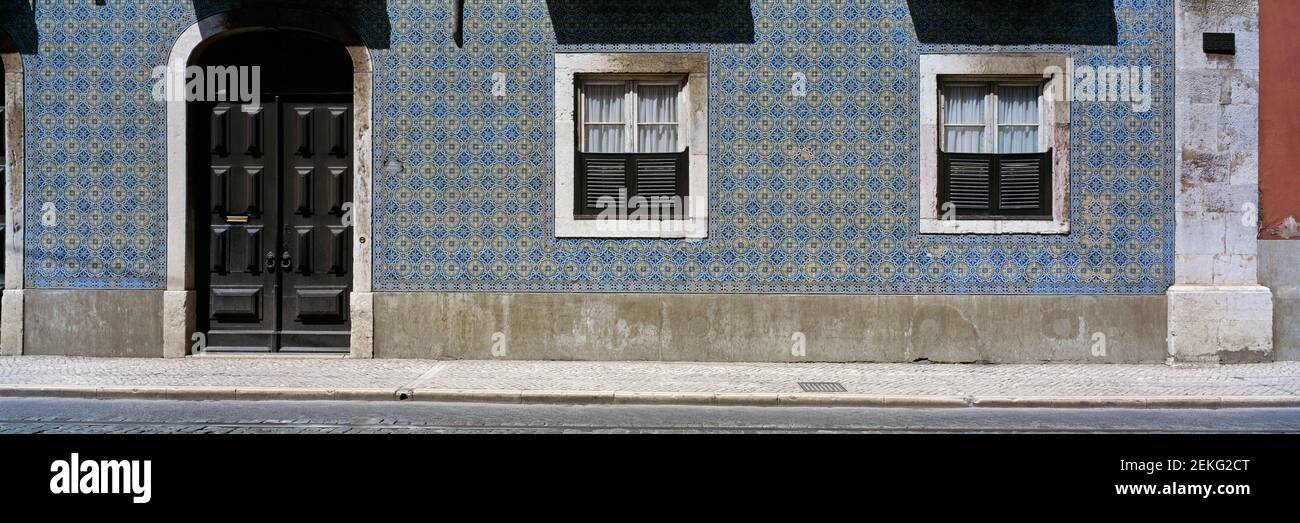 Traditional Portuguese tiles on townhouse facade, Lisbon, Portugal Stock Photo