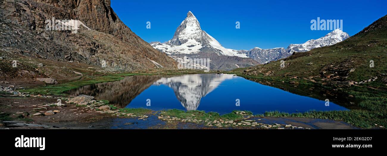 Landscape with view of Matterhorn and Riffelsee Lake, Valais, Switzerland Stock Photo