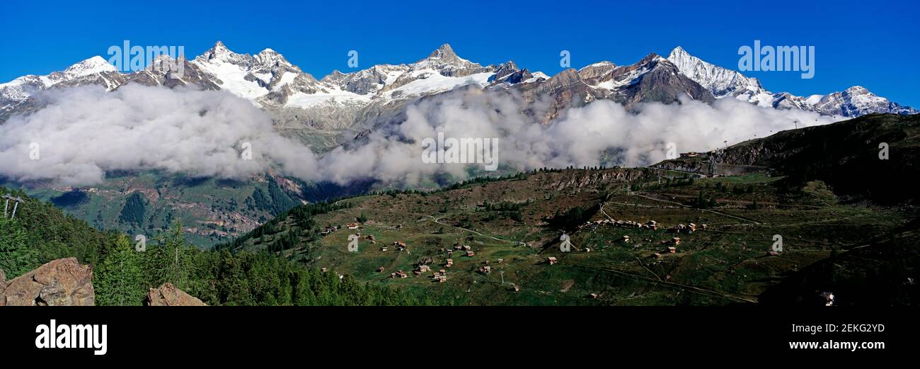 Landscape with scenic view of mountain range, Pennine Alps, Switzerland Stock Photo