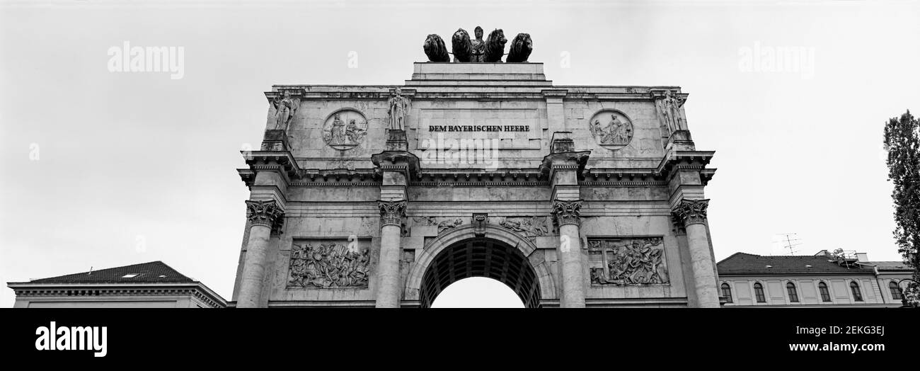 Black and white low angle view of Triumphal Arch (Siegestor), Munich, Bavaria, Germany Stock Photo