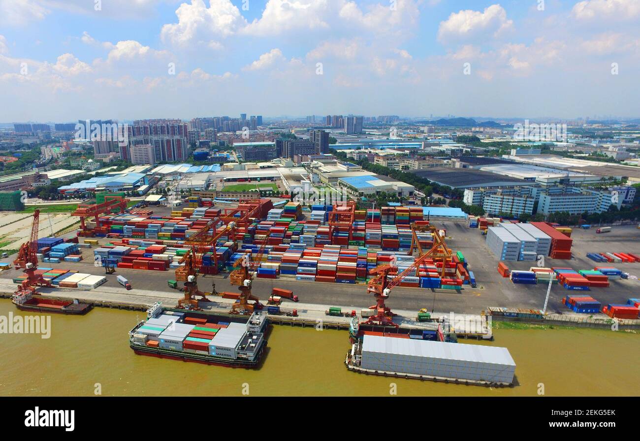 An aerial view of edifices, ports and the urban area of Beijiao town,  Shunde district, Foshan city, south China's Guangdong province, 28 August  2020. The value of industrial output of Beijiao town
