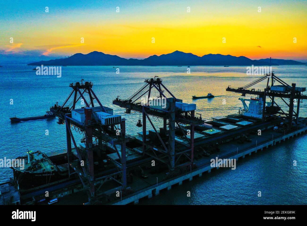 Aerial view of ships uploading and unloading containers at Zhoushan port in Ningbo city, east China's Zhejiang province, 31 August 2020. (Photo by Yao Feng/ChinaImages/Sipa USA) Stock Photo