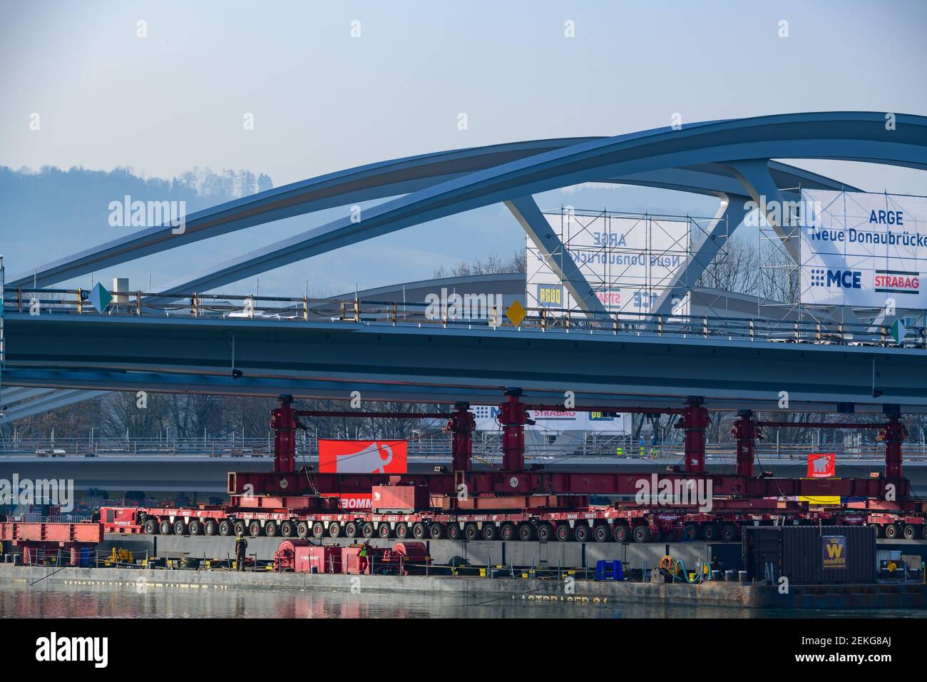 linz, austria, 23 feb 2021, mounting of a danube bridge by using ...