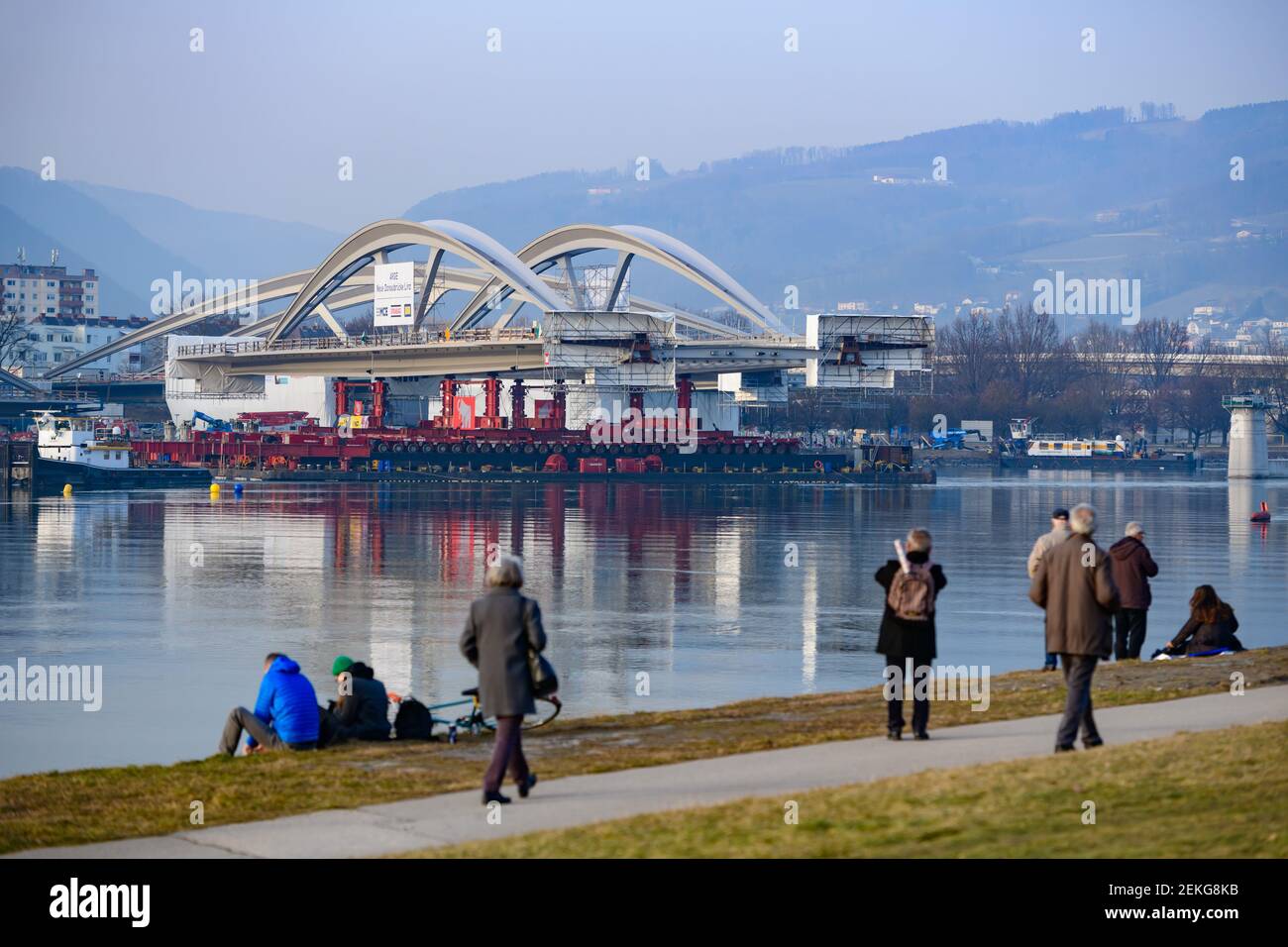 linz, austria, 23 feb 2021, mounting of a danube bridge by using ...