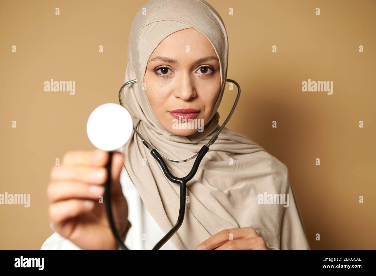 Confident portrait of an elegant female muslim doctor wearing hijab and