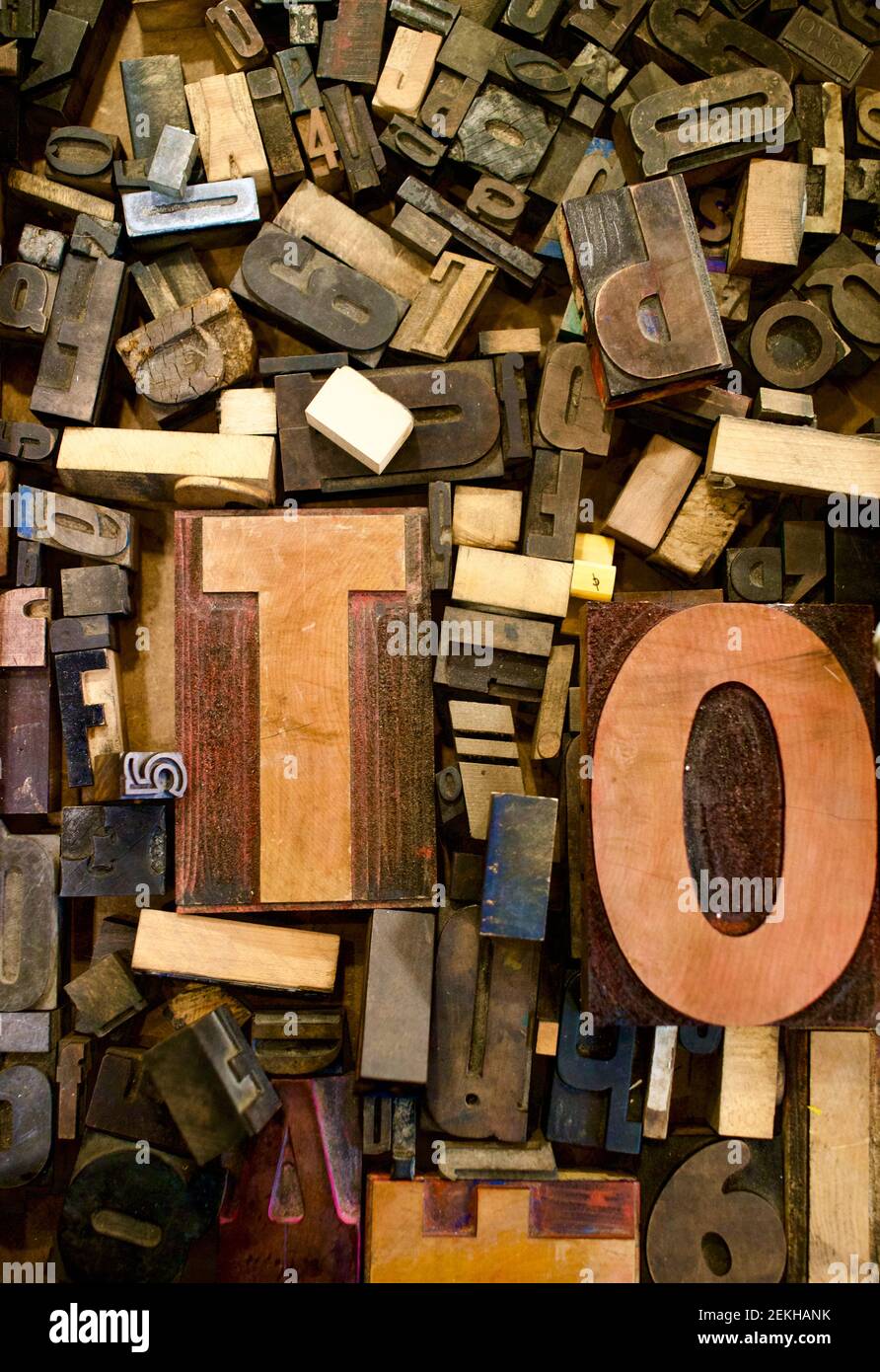 Loose type in collection of various fonts, letters, sizes, and material.  Good for background, or themes on words and language. Stock Photo