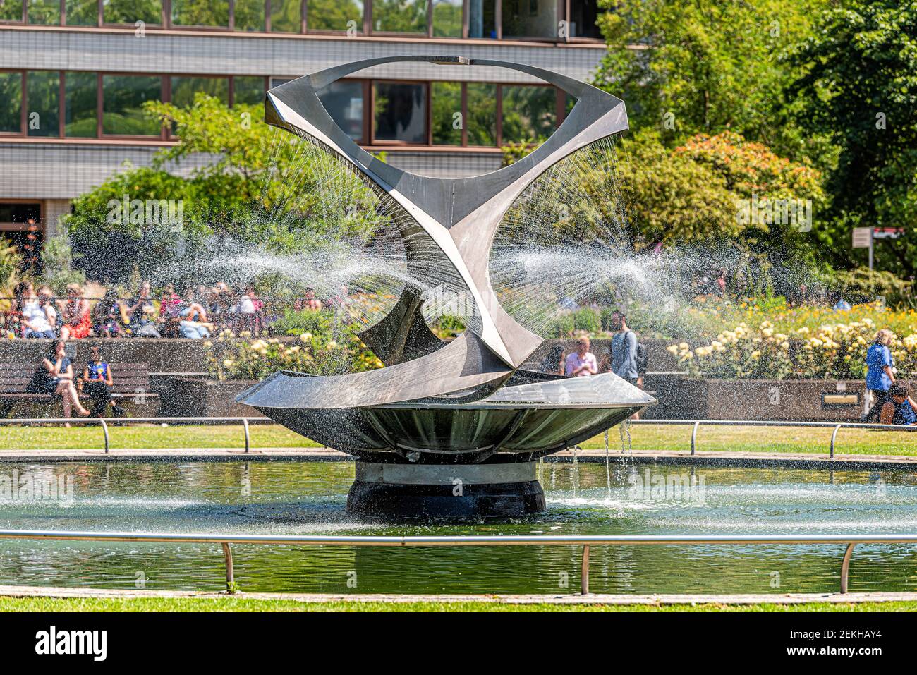 London, UK - June 25, 2018: Revolving Torsion modern architecture water fountain during sunny summer day in park by Naum Gabo in St Thomas Hospital in Stock Photo