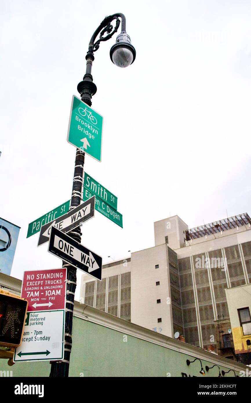 Street signs on the corner of Pacific Street and Smith Street in Brooklyn, New York City, USA Stock Photo