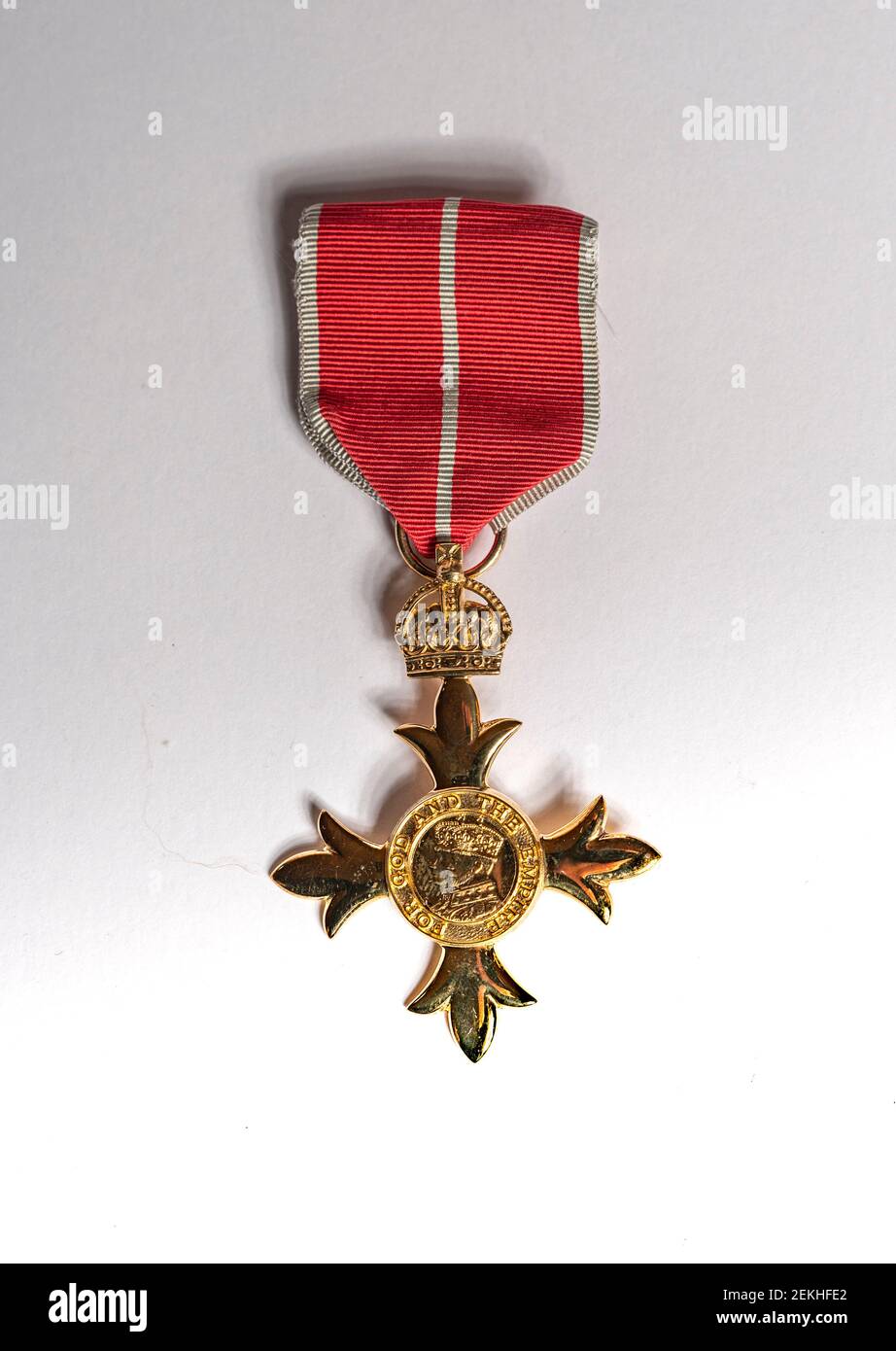 The OBE Medal - The Most Excellent Order of the British Empire is an order of chivalry, the OBE signifies an Officer of the Order Stock Photo