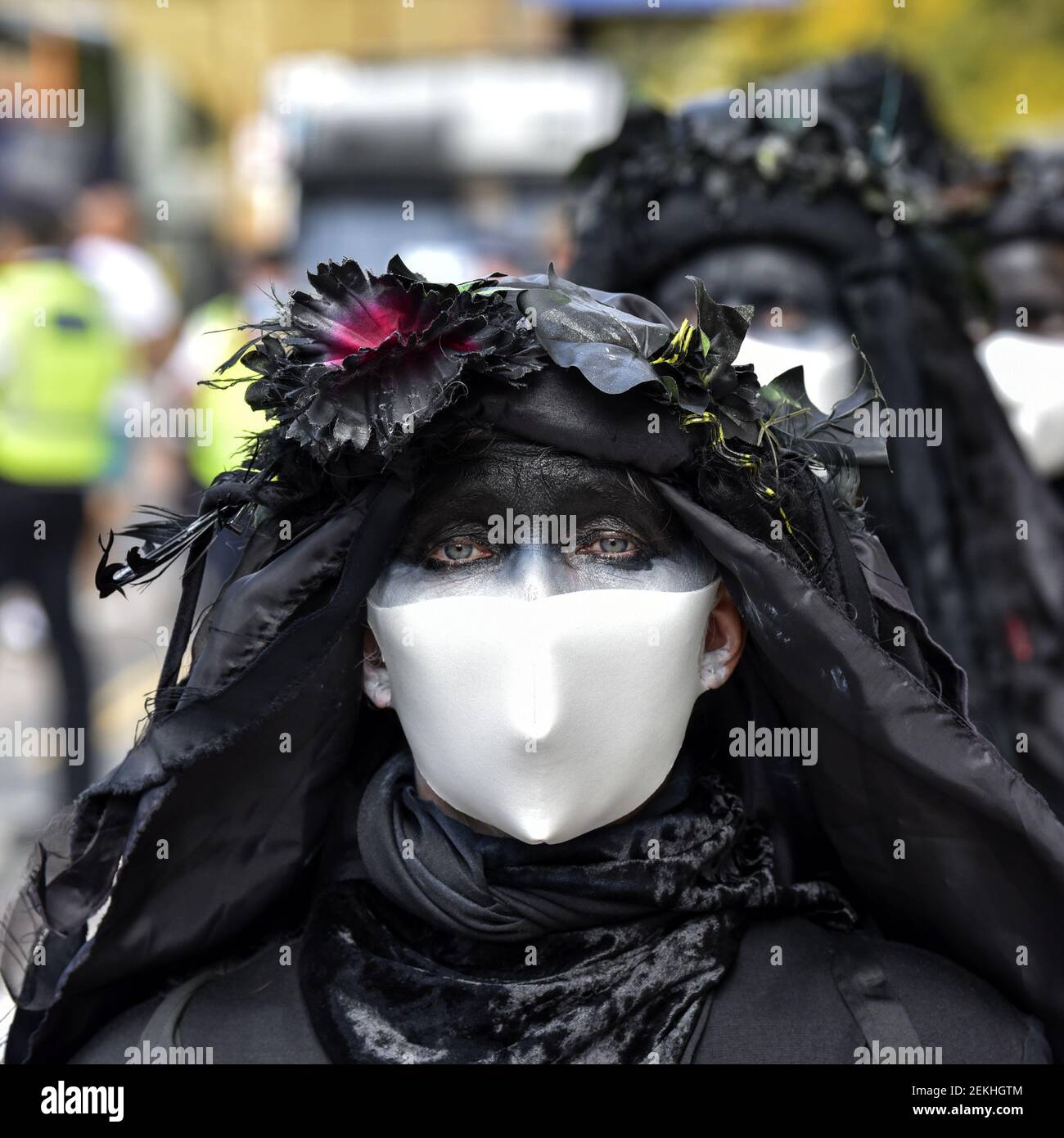 Member of the Black Brigade seen during the performance. Extinction ...