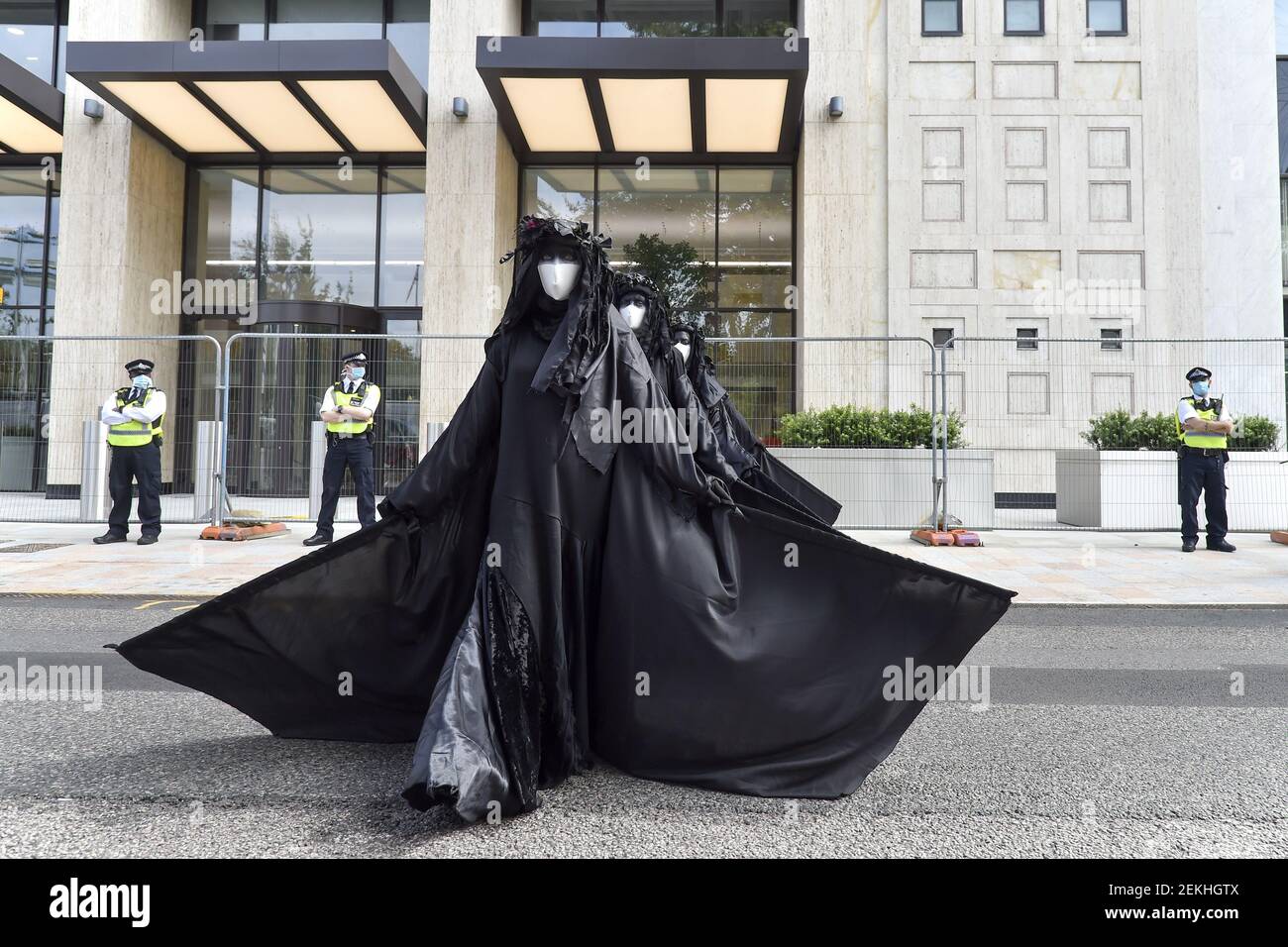 Member of the Black Brigade seen during the performance. Extinction ...