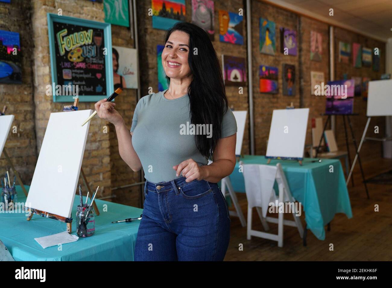 Lily Miteva, owner of Sip and Paint Chicago, prepares for online