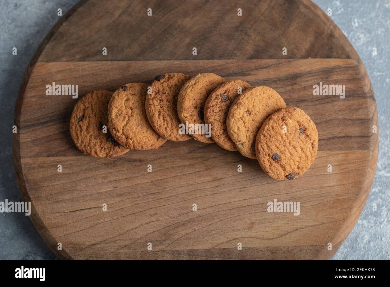 Delicious cookies with chocolate on a wooden board Stock Photo