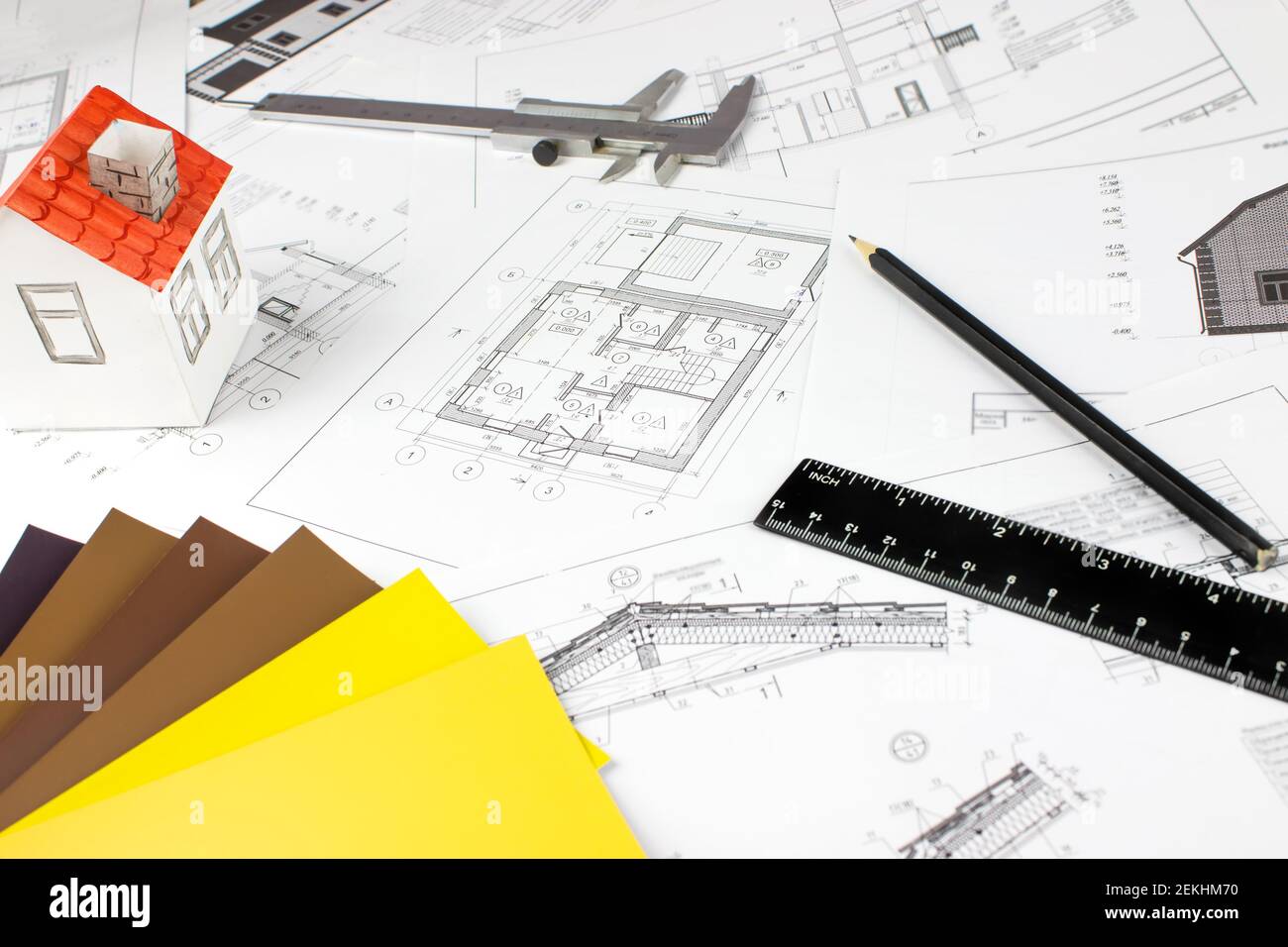Closeup of Architect engineer drawing plan with architect equipment