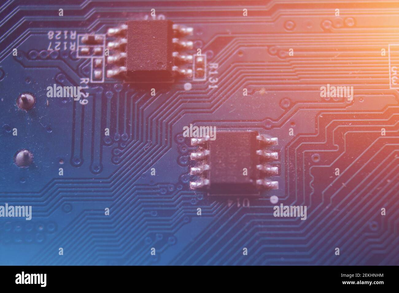 Blue circuit board background. Electronic board toned blue. Stock Photo