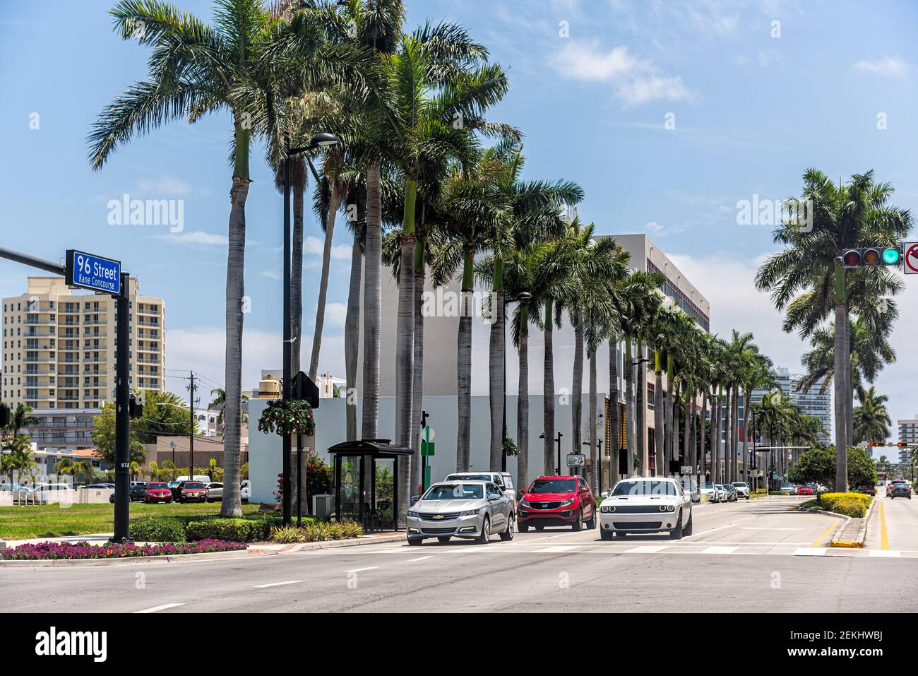 Bay Harbor Islands, USA - May 8, 2018: Intersection of 96 and West Bay Harbor drive street in Miami Dade county, Florida with cars driving on road wit Stock Photo