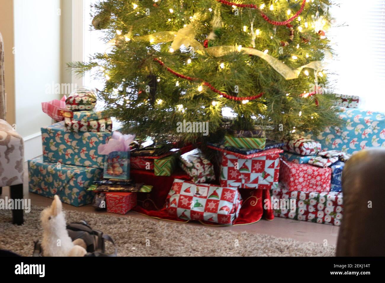 Christmas gifts under the tree Stock Photo