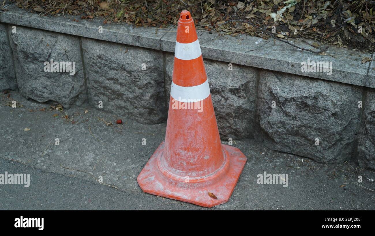 Red Traffic Cone on the Asphalt Road Stock Photo