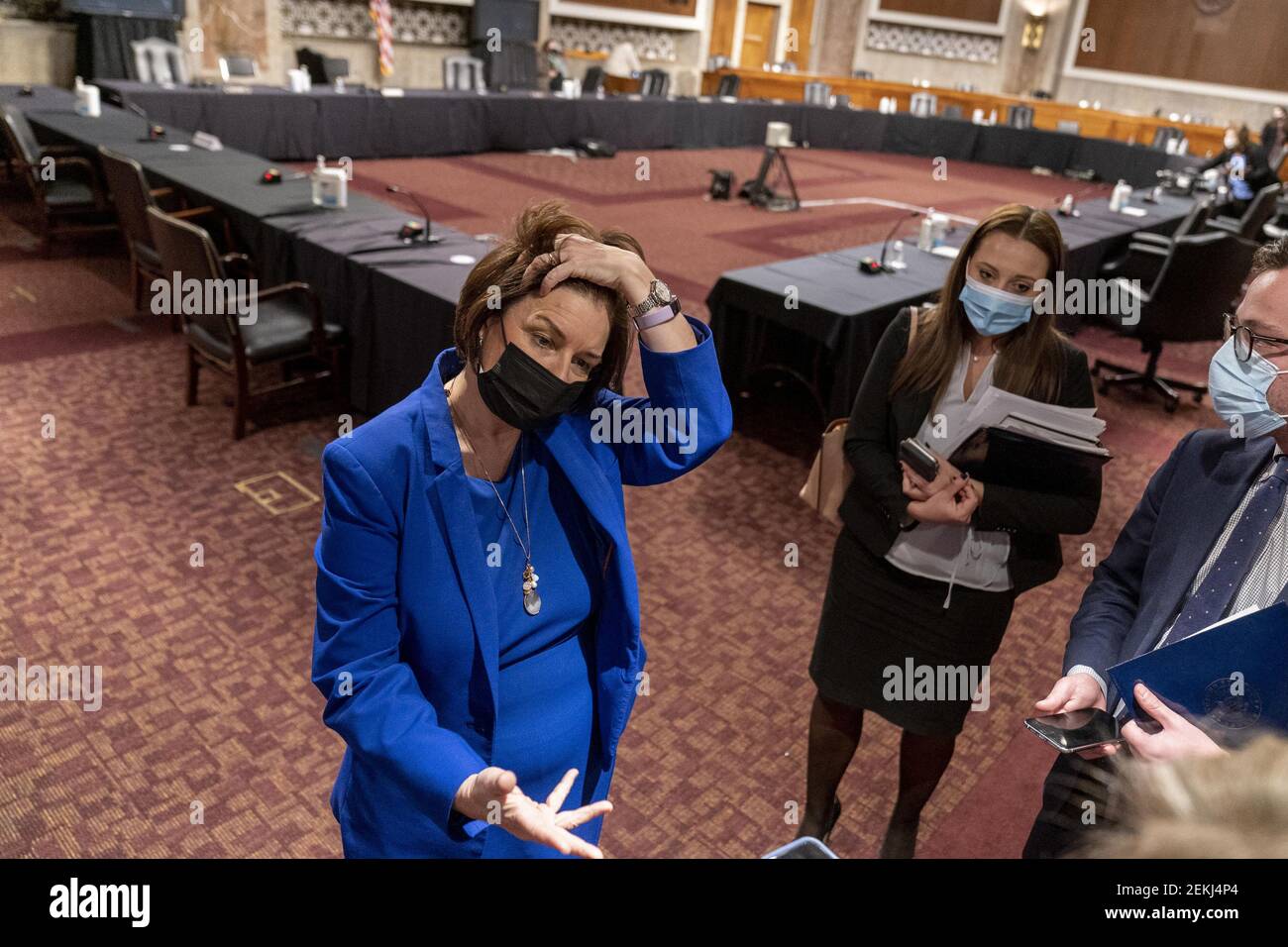 Washington, United States. 23rd Feb, 2021. Chairwoman Sen. Amy Klobuchar, D-Minn., speaks with reporters following a Senate Homeland Security and Governmental Affairs & Senate Rules and Administration joint hearing on Capitol Hill, Washington, DC on Tuesday, February 23, 2021, to examine the January 6th attack on the Capitol. Pool Photo by Andrew Harnik/UPI Credit: UPI/Alamy Live News Stock Photo