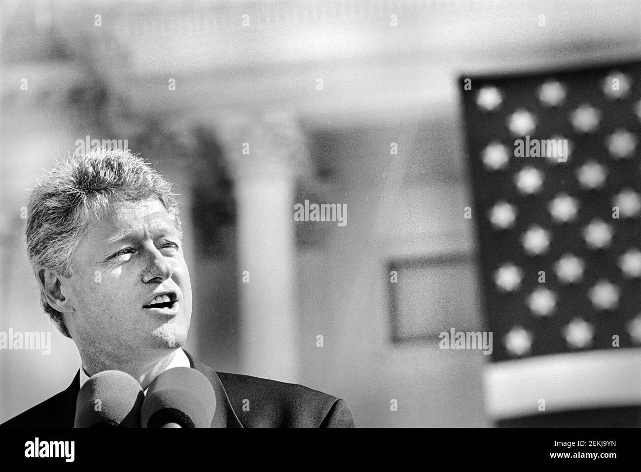 U.S. President Bill Clinton speaking into Microphone at U.S. Capitol during Ceremony for return of Statue of Freedom to the top of U.S. Capitol, Washington, D.C., USA, Maureen Keating, October 1993 Stock Photo