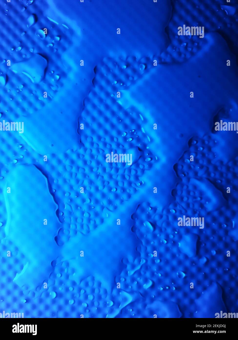 Splashes of water on shower tray highlighted in color Stock Photo Alamy