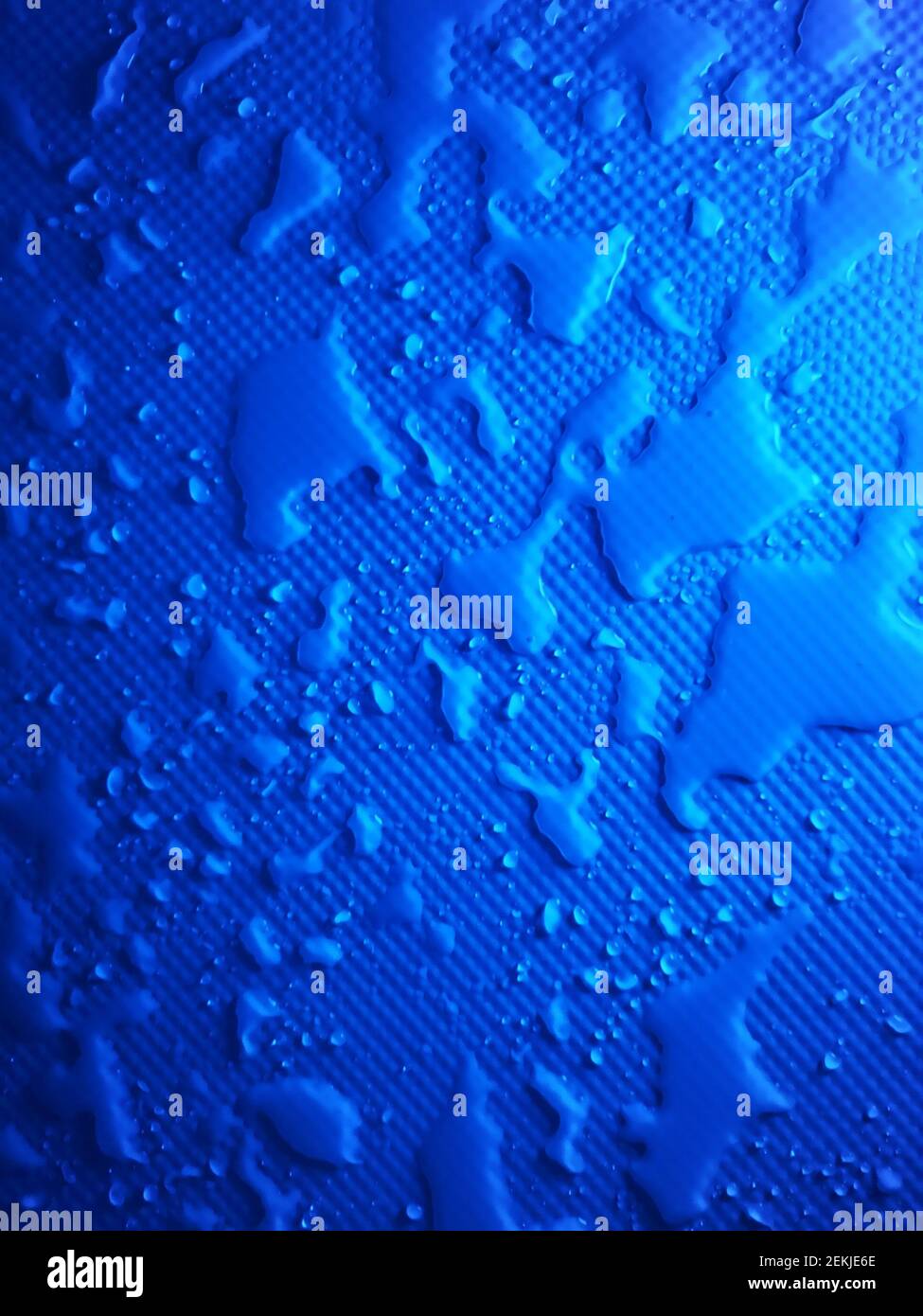 Splashes of water on shower tray highlighted in color Stock Photo Alamy