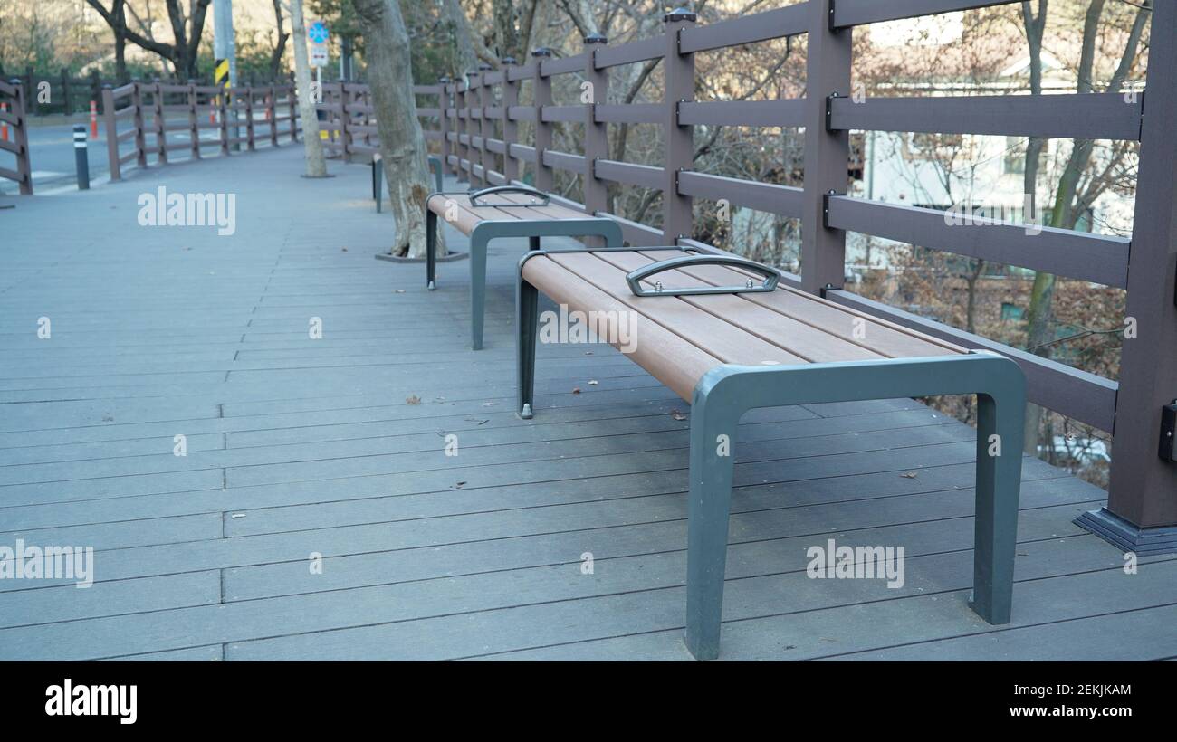 Two Wooden Benches on the Winter Hiking Trail Stock Photo