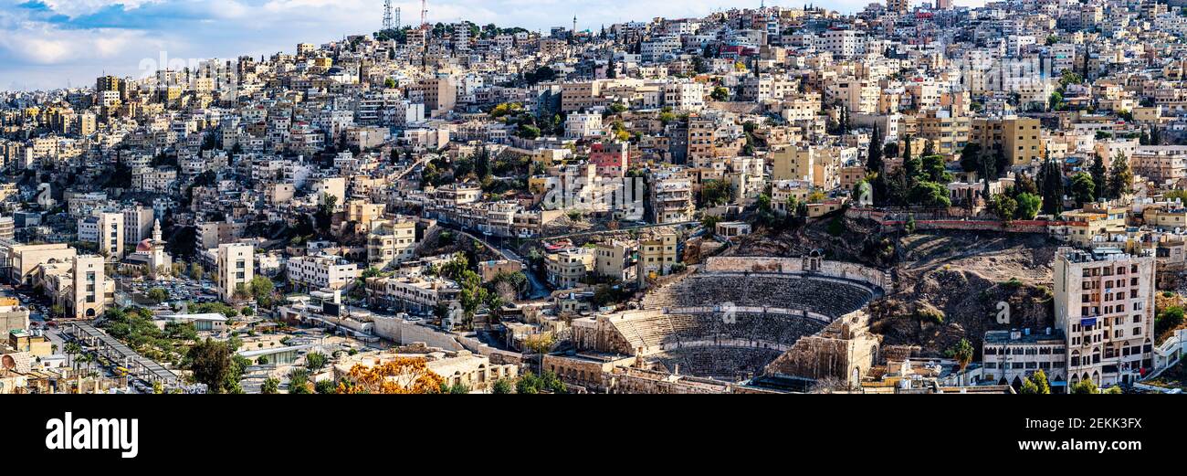 Cityscape with view on ancient Roman Amphitheater, Amman, Jordan Stock Photo